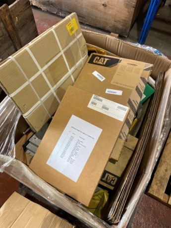 2 boxes of assorted Caterpillar generator spares as lotted